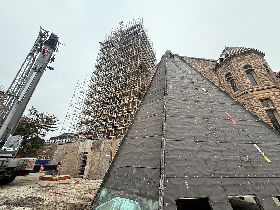 Altgeld Hall's bell tower roof shown on the ground following its recent removal.