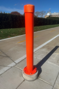 Orange Eco-Counter post installed near the Morrow Plots on the Urbana campus