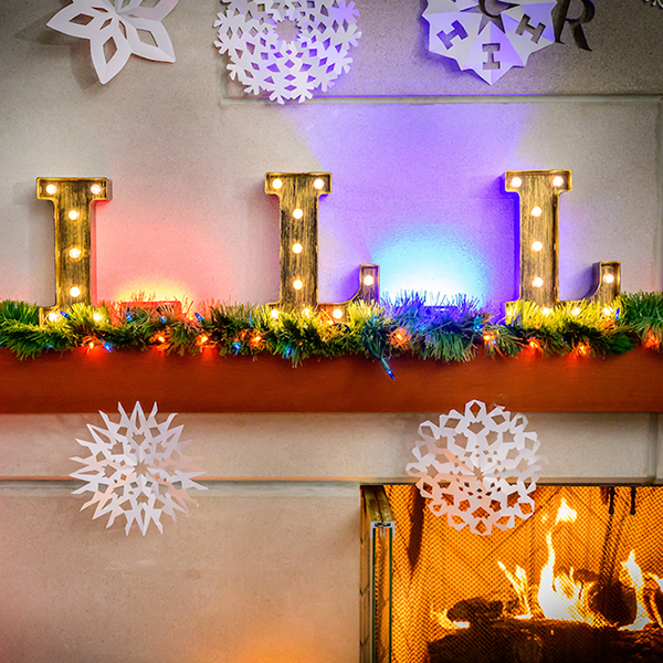 I-L-L shown on a mantle as a part of holiday decorations.