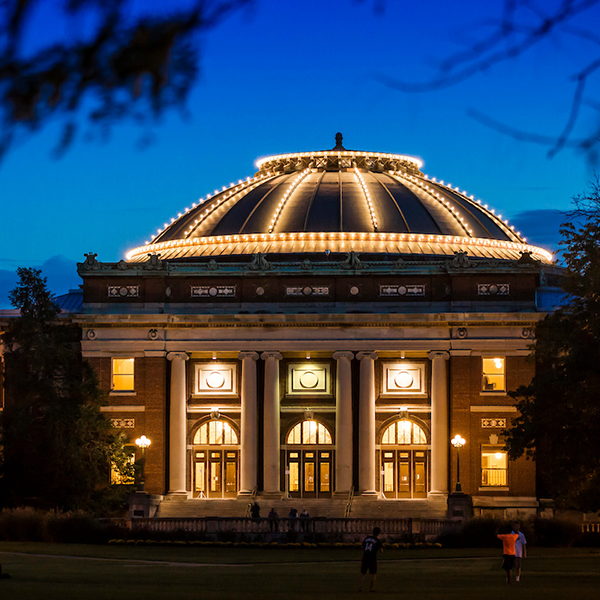 The dome of Foellinger Auditorium shown at night with LED bulbs lights outlining the specific sections of the roof.