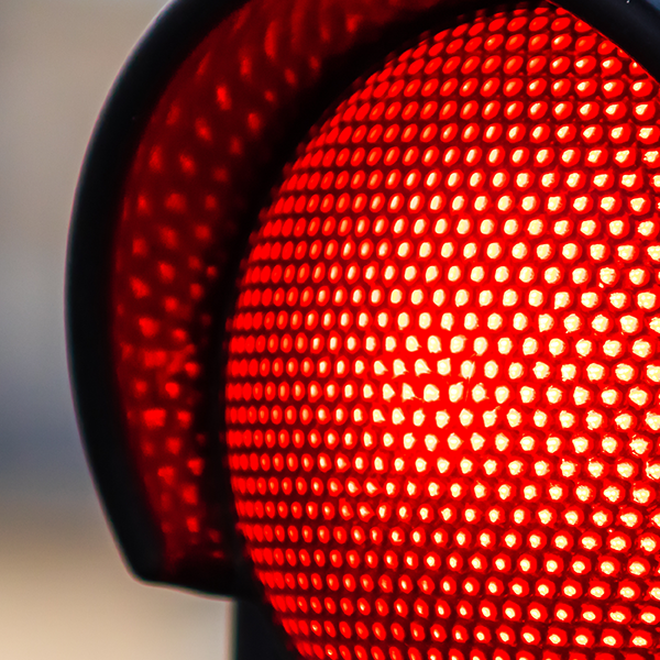 A close up of the LEDs on a red light of a traffic signal