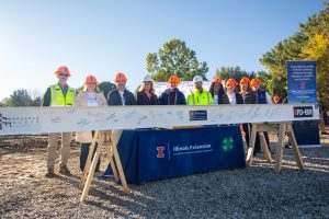 Doris Kelley Christopher Illinois Extension Center beam signing and leadership