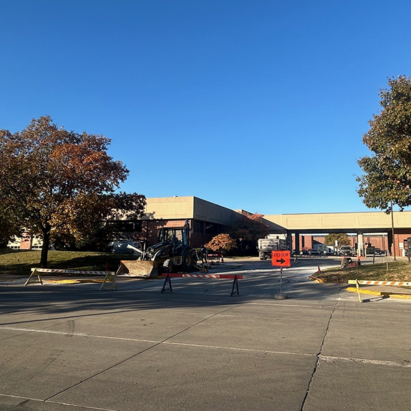 Exterior facade of the Garage and Car Pool showing the main lobby and fueling station